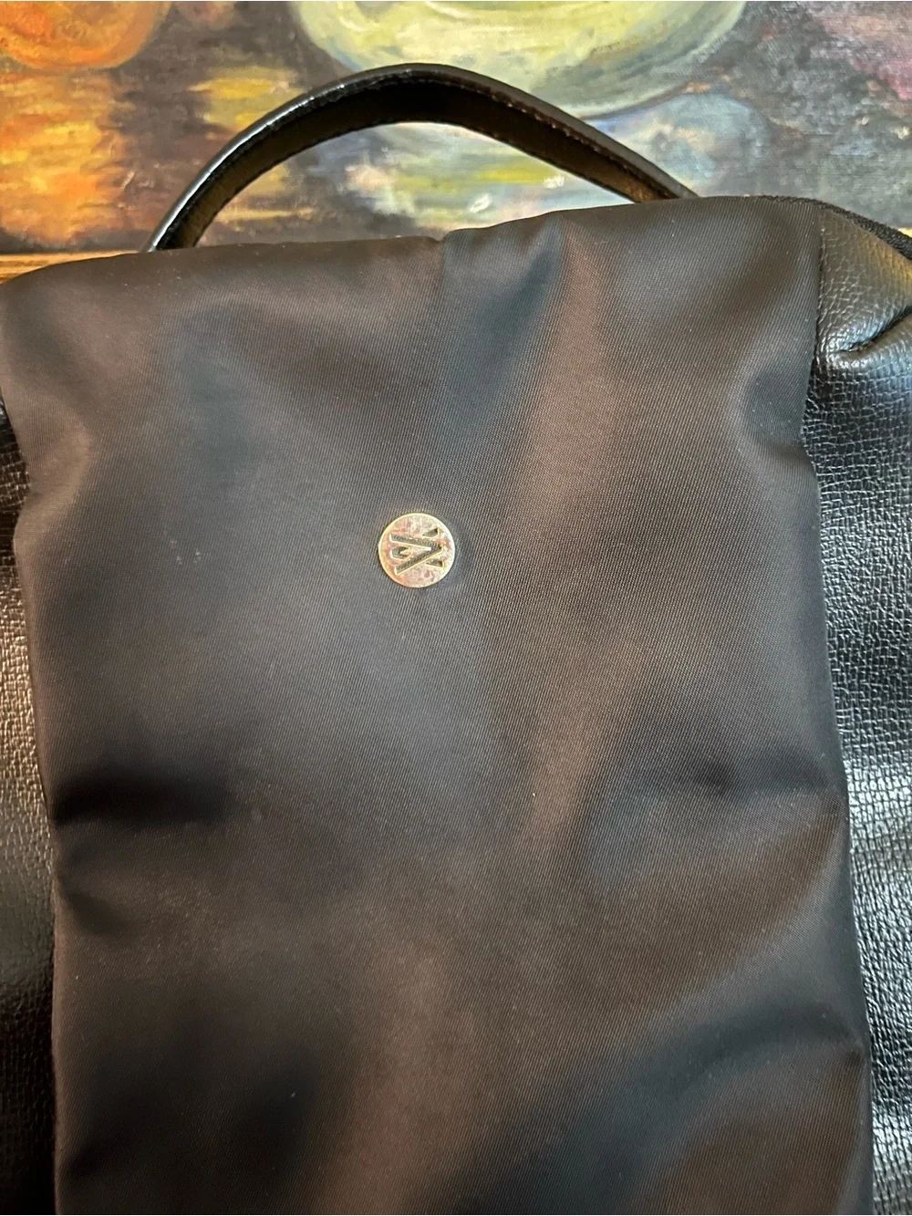Travanti Nylon and Faux Leather Backpack
